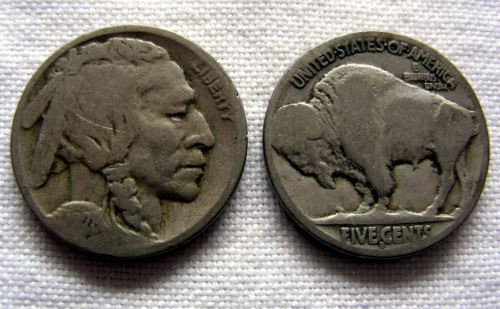 The front and back of a Buffalo Nickel. This coin is used in money magic.